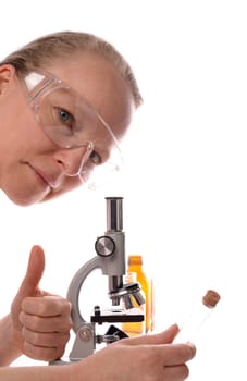 Female doctor with a microscope and thumb up