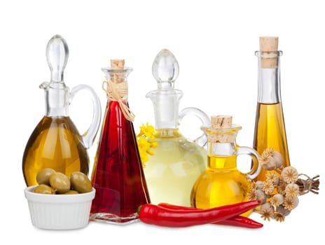 Various cooking oils in bottles and carafes