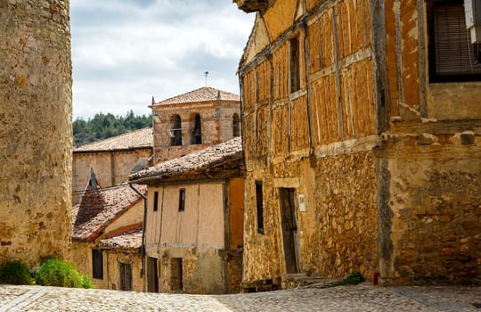 Medieval adobe house facade in Calatanazor, Spain