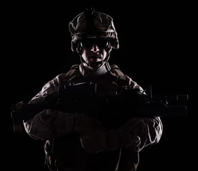 US marine with the rifle on black background