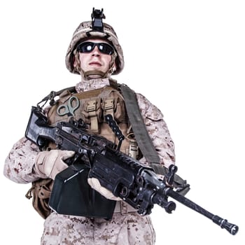US marine with his assault rifle on white background