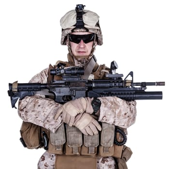 US marine with his assault rifle on white background