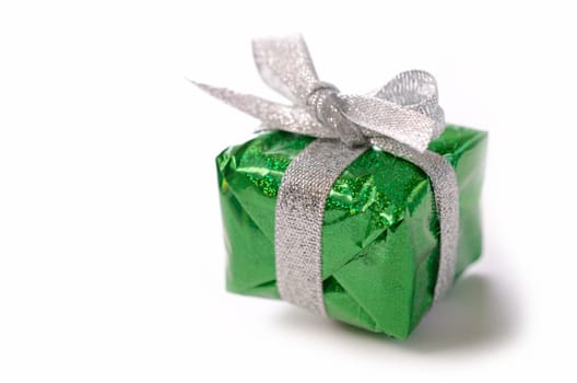 Green gift box with a bow