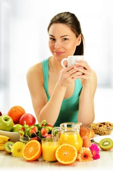 Young woman having breakfast. Balanced diet.