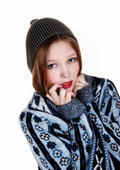 A young woman in a blue-grey sweater and knitted hat, isolated for.white background..