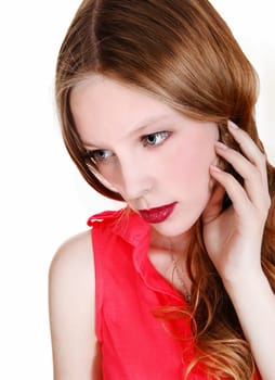 A closeup portrait picture of a young pretty teenager in a red blouse,.looking down, isolated for white background..