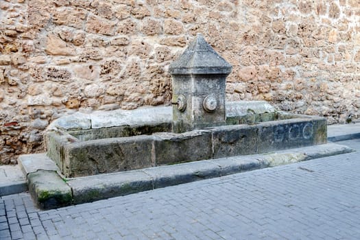 Old fountain and drinking trough in Burgo de Osma, Soria, Spain