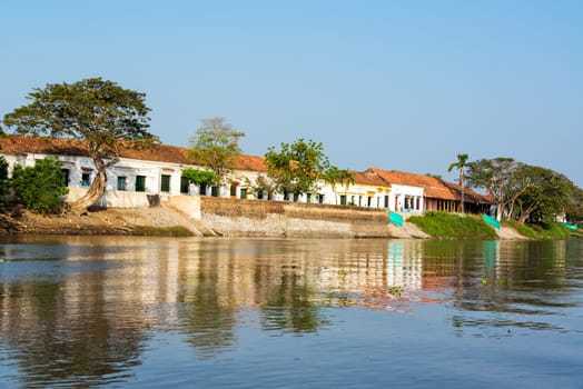 Historic colonial city of Mompox, Colombia reflected in the Magdalena River
