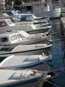 anchored fishing boats in the port