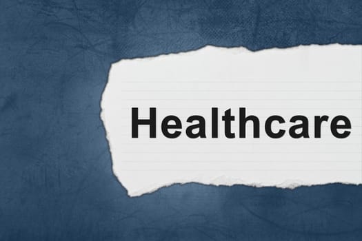 healthcare with white paper tears on blue texture
