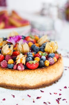 Closeup of delicious sponge cake topped with fresh berries