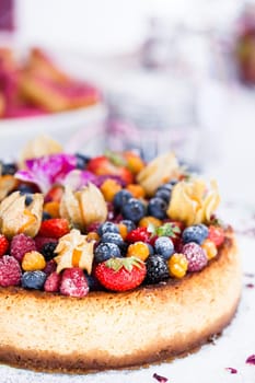 Closeup of delicious sponge cake topped with fresh berries
