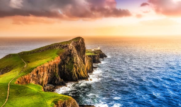 Colorful ocean coast panoramic sunset at Neist point lighthouse, Scotland, United Kingdom