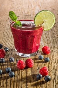 Red fruit smoothie made from wild berries