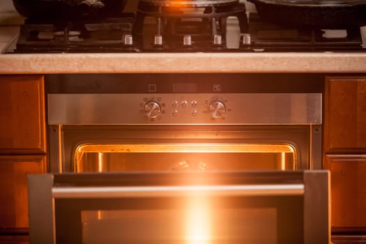 Closeup photo of open incandescent open oven