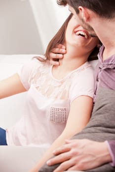 young girl is about to kiss a young boy