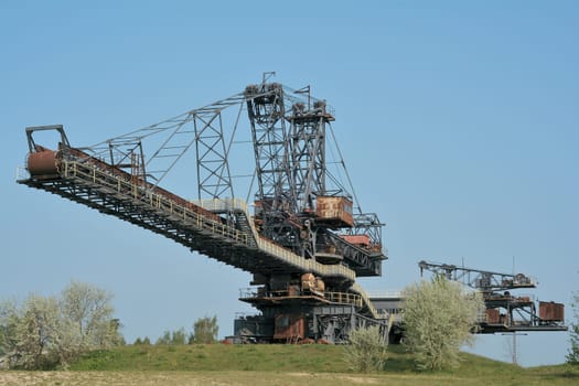 gigantic excavators in the disused Ferropolis opencast mine
