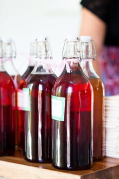 Closeup of bottles of fruity flavoured apertifs