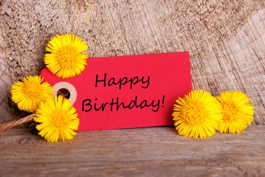 Red Tag with Happy Birthday on it and Yellow Flowers
