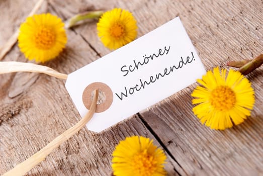 White Banner with the German Words Schoenes Wochenende which means Happy Weekend