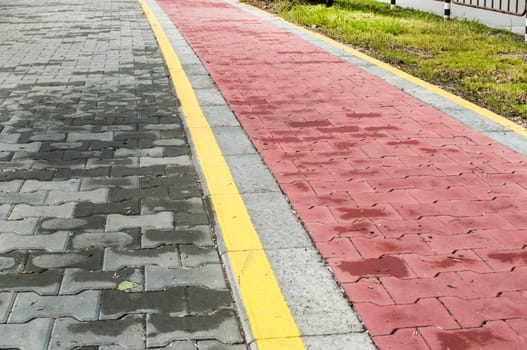 Marked bicycle path as part of city pedestrian zone