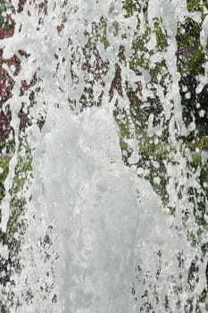 Water fountain format-filling recorded up close