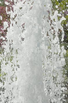 Water fountain format-filling recorded up close