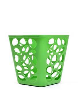green plastic basket isolated on white background