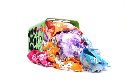 unwashed cloth in the basket on white background