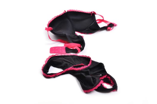 unwashed sexy female underwear on white background