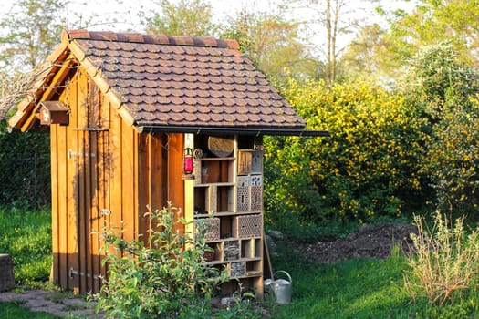 Insect hotel at a garden hut