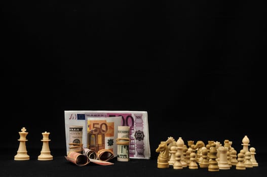 Money Strategy Concept White Chess and Currency on a Black Background