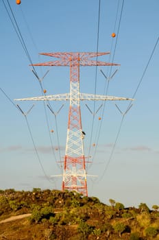 Energy Electricity Power Pylon on a Blue Sky