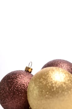 Christmas baubles on a white background with space for text