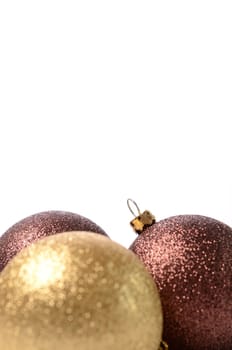 Christmas baubles on a white background with space for text