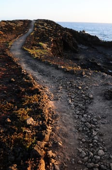 Travel Concept Background - Pathway in the Volcanic Desert Tenerife Canaty Islands Spain