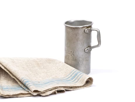 Measuring cup and linen cloth