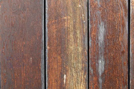Vertical wooden strips background with light brown