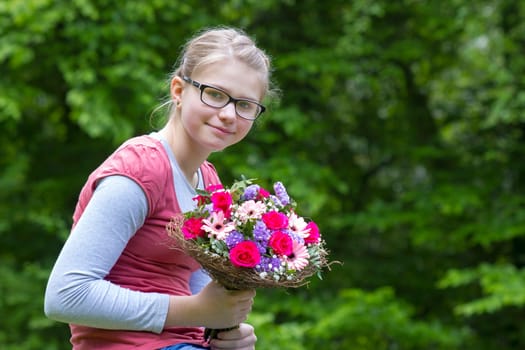 portrait of a beautiful young girl with flowers