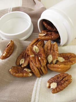 Pecans in a porcelain tin
