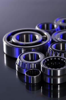 Close-up of various ball bearings in UV light