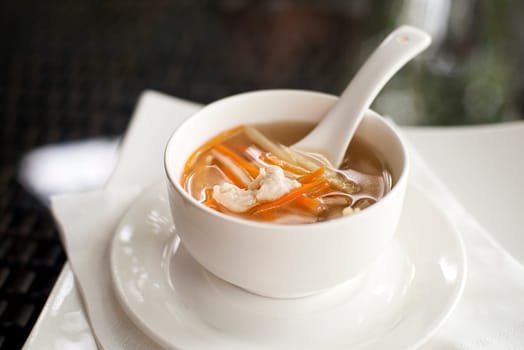 Chinese chicken soup in restaurant close up