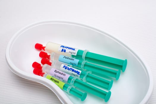 Anaesthetic induction syringes in a kidney dish
