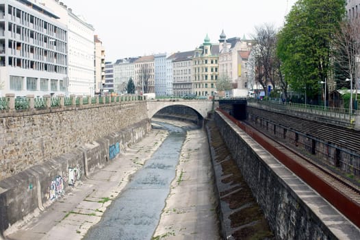 Photographing infrastructure,a water canal and tram tracks in Vienna's city centre.