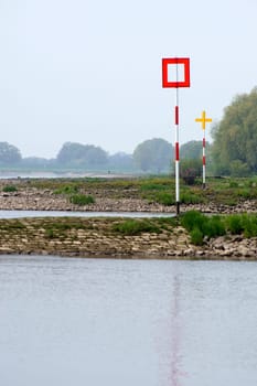 The photograph of two signs on a stall on the river Elbe.