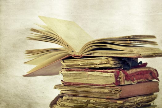 Pile of Old books on vintage background