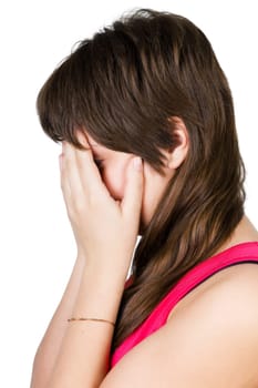 beautiful young girl crying. isolated on white background