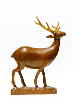 the Carved wooden deer with white background