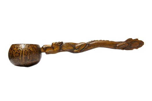 the Coconut shell dipper with dragon handle on white background