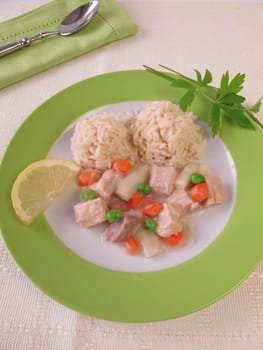 Chicken frying with carrots,peas and asparagus